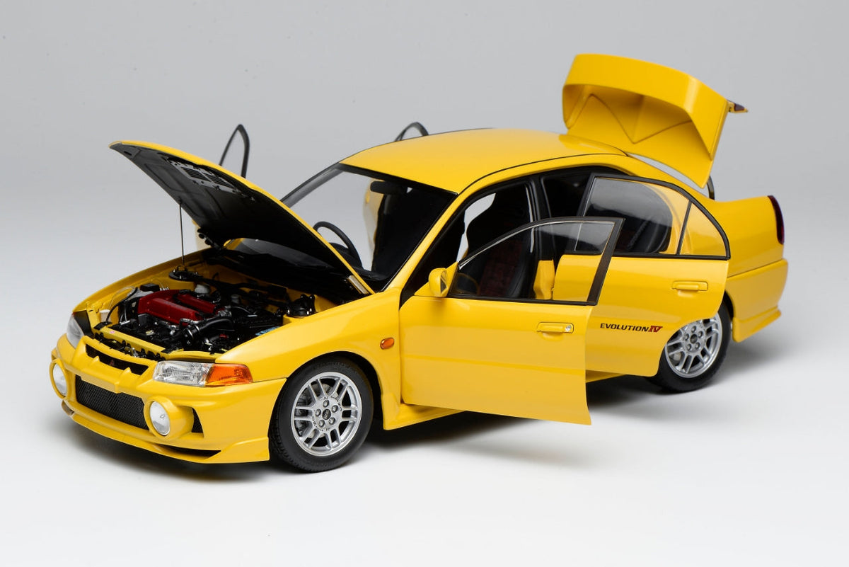 Motorhelix 1:18 Mitsubishi Lancer Evolution IV DANDELION YELLOW M84006