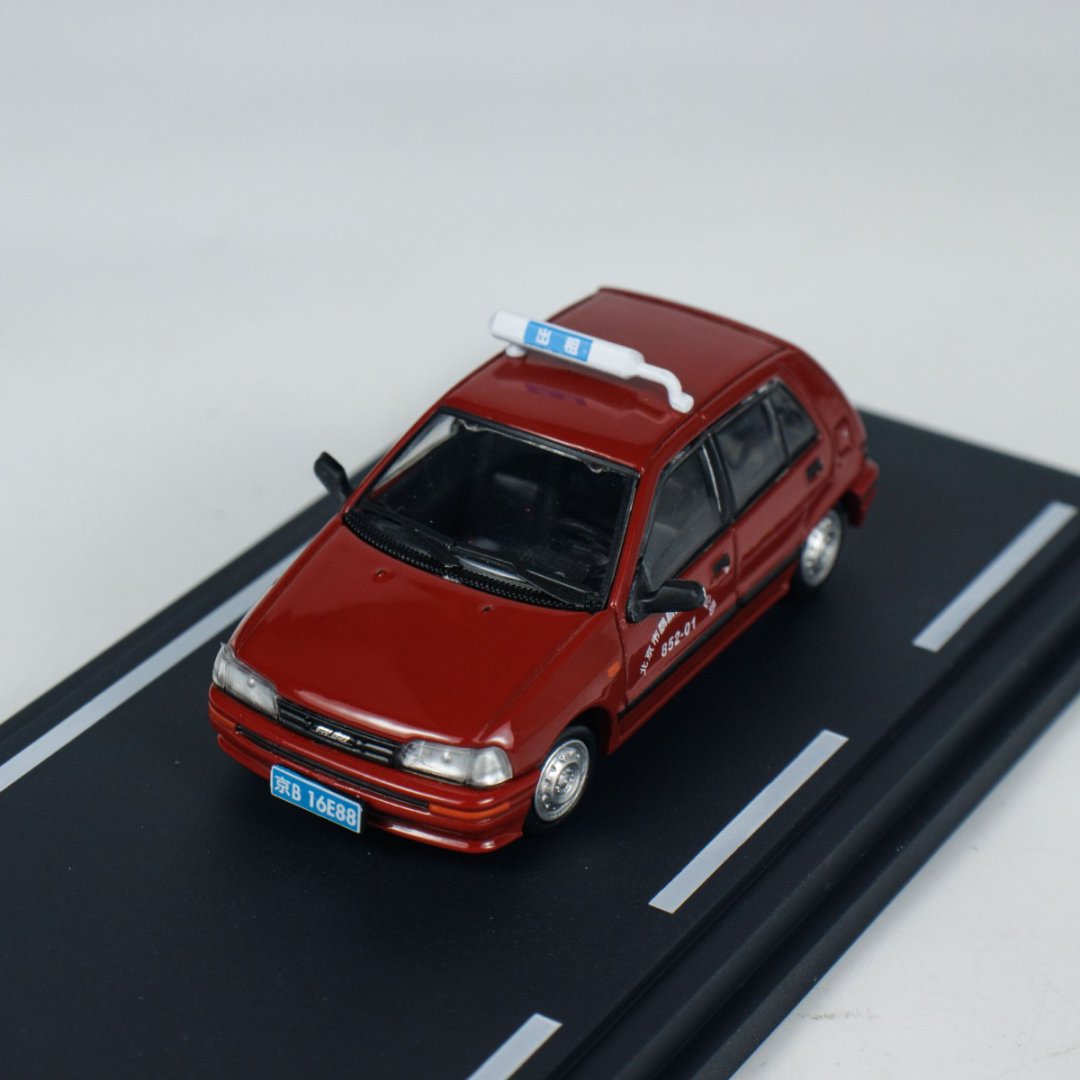 BM Creations 1:64 Daihasui Charade Beijing Taxi HEC 64B0445