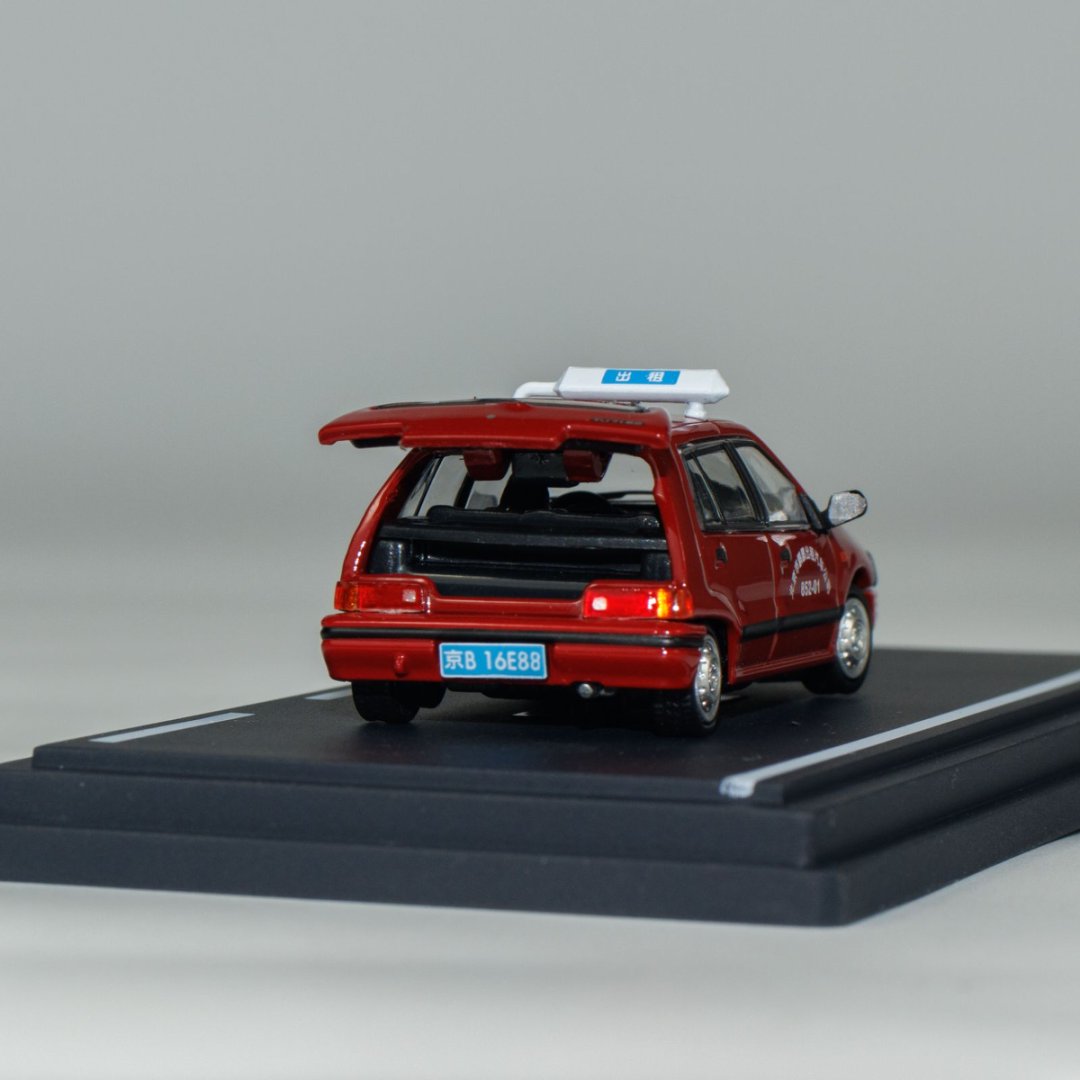 BM Creations 1:64 Daihasui Charade Beijing Taxi HEC 64B0445