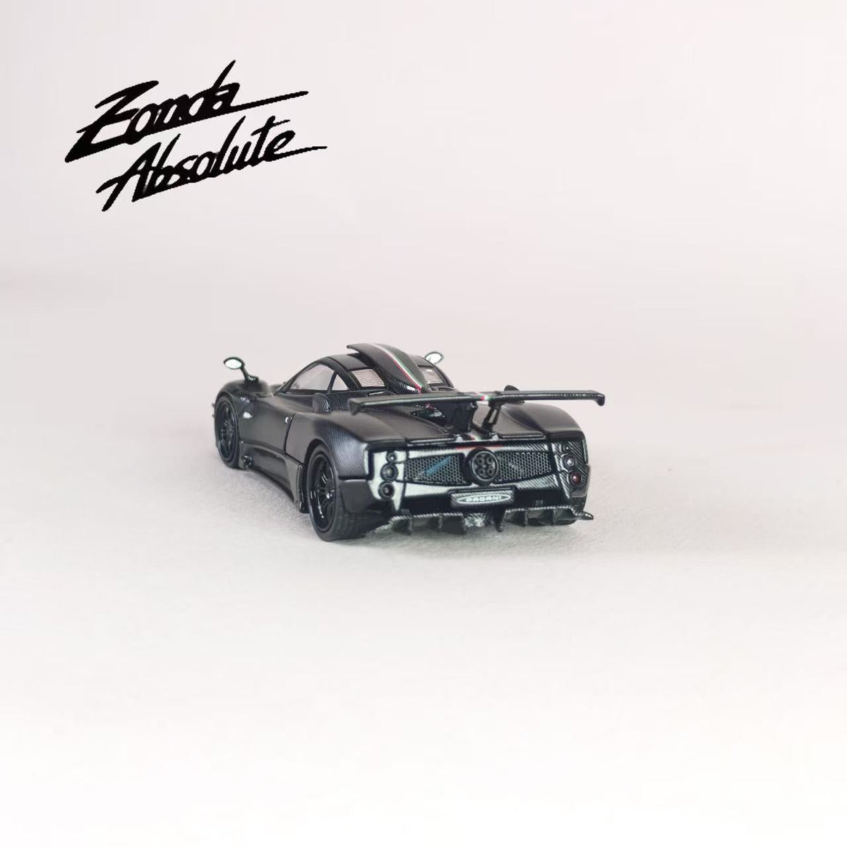 [Preorder] Rhino Model 1:64 Pagani One-off Series. Zonda AbsoIute EVO #76061 (Full Black Matte Carbon Fiber With Italian Tricolor Stripes)