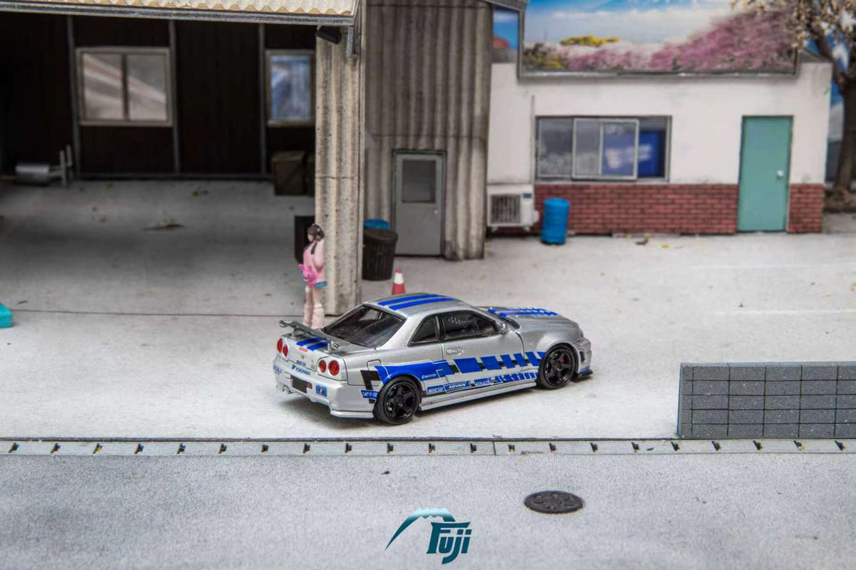 [Preorder] Fuji 1:64 Nissan Skyline GT-R R34 Nismo Z-Tune Silver Blue Livery (3 Variants)
