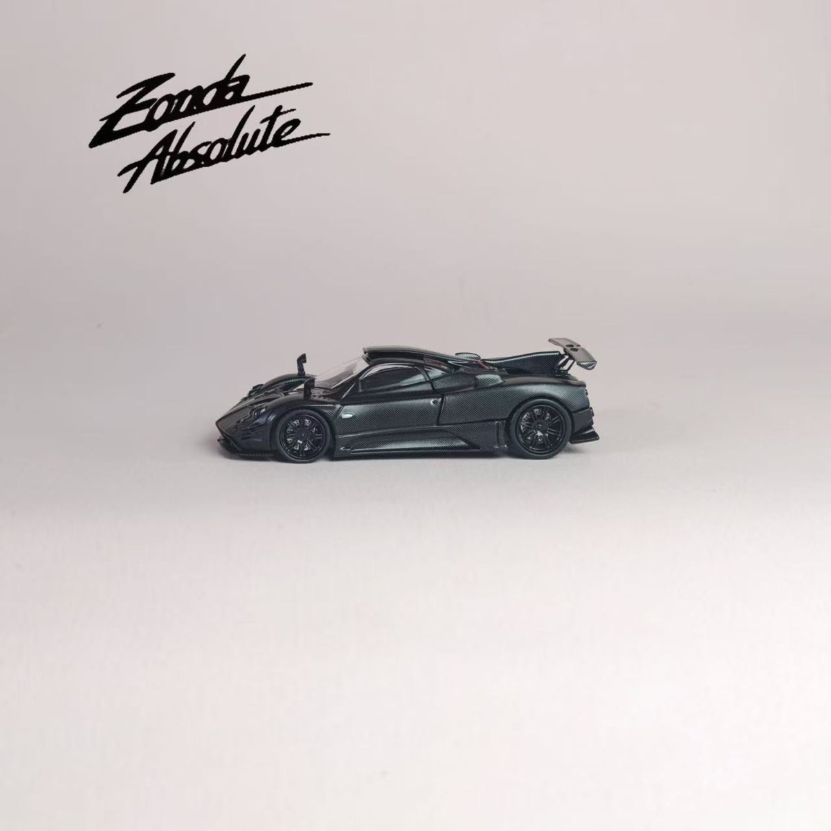 [Preorder] Rhino Model 1:64 Pagani One-off Series. Zonda AbsoIute EVO #76061 (Full Black Matte Carbon Fiber With Italian Tricolor Stripes)