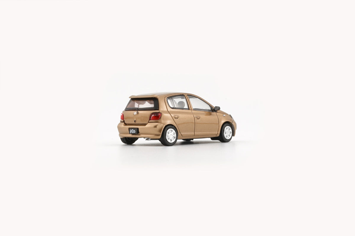 BM Creation 1:64 Toyota 1998 Echo / Vitz 5 Doors - Golden 64B0370