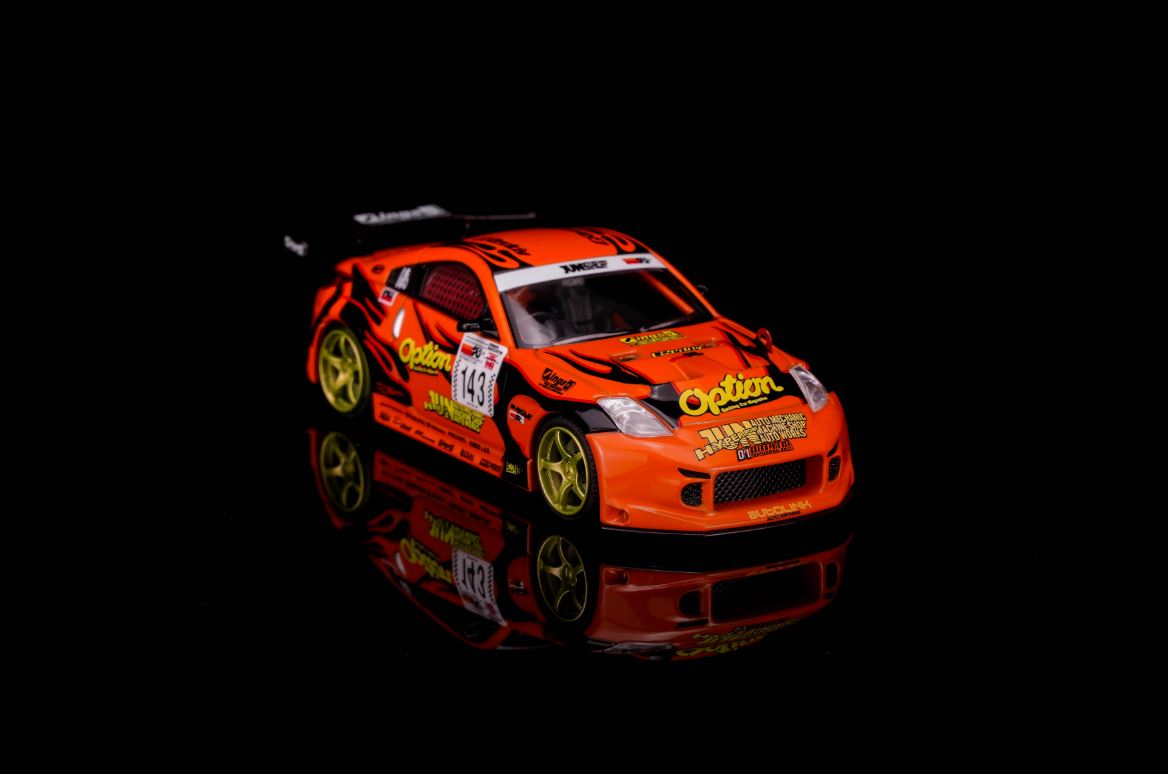 [Preorder] MOTORHELIX × Mr.Hiro × Option 1:64 Nissan Fairlady Z，"Option Stream Z" ‘02（Z33) M63851